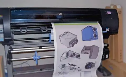 A banner showcasing HVAC products being printed by a wide format printer.